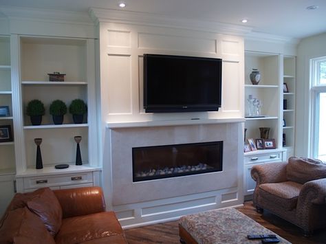 TV/fireplace wall with built-ins and moulding/trimwork. Living Room Designs Tv, Living Room Designs Tv Wall, Tv Wall With Fireplace, Paneled Fireplace, Wall With Fireplace, Decorative Columns, Fireplace Tv Wall, Linear Fireplace, Fireplace Built Ins