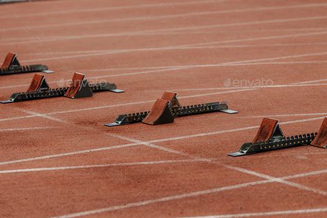 starting blocks on start line by sportpoint74 on PhotoDune. starting blocks on start line of running track stadium 400m Hurdles, Athletics Track, Track Pictures, Triple Jump, Running Track, Shot Put, Pole Vault, Starting Line, Run Runner