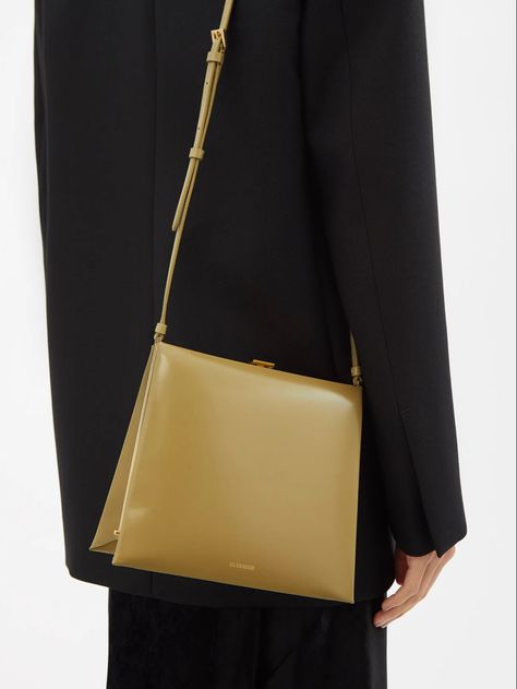 A FINE THING : JIL SANDER ‘trace’ clasp bag —— matchesfashion.com #jilsander Purses 2024, Jil Sander Bag, Jil Sander Shoes, Clasp Bag, Jil Sanders, Vintage Luggage, Womens Khakis, Fancy Bags, Couple Photography Poses