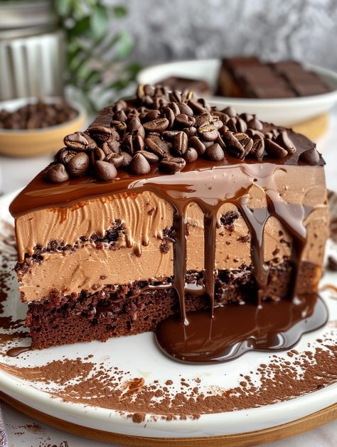 This recipe combines rich chocolate cake layers with a decadent coffee-infused mousse for a delightful mocha mousse cake.  Ingredients ❤️  For the Chocolate Cake: 1 1/2 cups all-purpose flour 3/4 cup unsweetened cocoa powder 1 1/2 teaspoons baking powder 1/2 teaspoon baking soda 1/4 teaspoon salt 1/2 cup unsalted butter, softened 1 1/2 cups granulated sugar 3 large eggs 1 teaspoon vanilla extract 1 cup milk 1/2 cup strong brewed coffee (cooled) For the Mocha Mousse: 1 envelope (2 1/4 teaspoons) Mocha Mousse Cake, Coffee Chocolate Cake, Chocolate Espresso Cake, Mocha Cake, Mocha Mousse, Unsweetened Cocoa Powder, Cake Layers, Rich Chocolate Cake, Chocolate Lava Cake