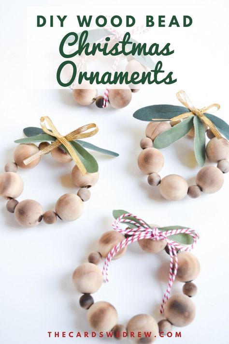 Learn how to make these easy DIY Wood Bead Ornaments and skip over the Etsy sellers! These DIY Christmas Ornaments are cute and fun and can be great for a farmhouse theme or as decorations on Christmas packages. All you need are wood beads, floral wire, and some decorations! #woodbead #ornaments #DIY #Christmas #farmhouse Wood Bead Christmas Ornaments, Wood Bead Ornaments, Bead Christmas Ornaments, Wood Bead Christmas, Natal Natural, Beaded Ornaments Diy, Christmas Diy Kids, Jul Diy, Wood Beads Diy