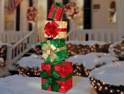 And it cost her next to nothing. Candy Decorations Diy, Gift Boxes Decoration, Outdoor Christmas Decor, Gift Towers, Christmas Apartment, Christmas Decorations Diy Outdoor, Five Below, Candy Christmas Decorations, Outdoor Holiday Decor