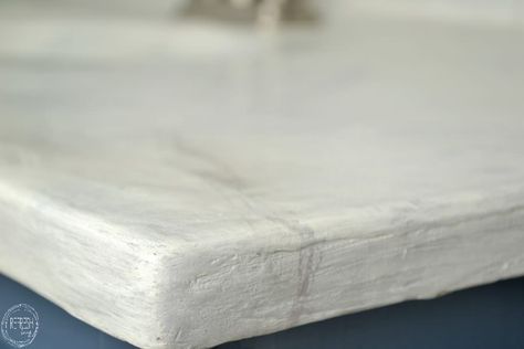 Easy DIY concrete countertops can be installed right over your old countertop surface using a feather finish flooring concrete. Feather Finish Concrete Countertops, White Concrete Countertop, Drop Cloth Slipcover, Diy White Concrete Countertops, Paint Tiles, Diy Concrete Counter, Natural Stone Counter, White Granite Countertops, White Concrete Countertops