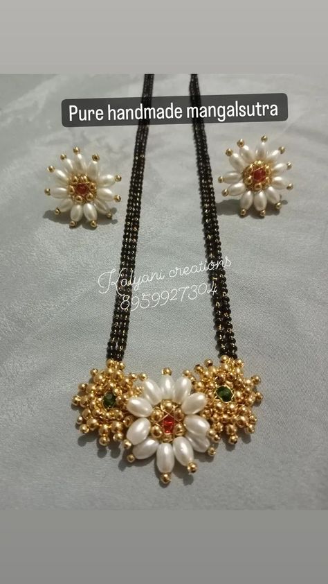 Pure handmade mangalsutra Colour can be customise For order 8959927304 Whatsapp https://chat.whatsapp.com/IaR62SJCZ2k0YVpJbIkIVl Instagram https://www.instagram.com/invites/contact/?i=gmqlcekup3t1&utm_content=m205bo4 YouTube https://youtube.com/channel/UCrWdElOTpHRmMq88Z2CKccg #reels #reelsinstagram ,#reelsvideo , #reelitfelit , #explore , #explormore , #explorepage , #jewelry ,#jewellery ,#bulk ,#usa,#cenada ,#india,#tranding , #trandingreels♥️ , #instagood ,#instagram #fabricmirrormangalsu Maharashtrian Nath Making, Handmade Mangalsutra Designs, Handmade Mangalsutra, Moti Jewellery, Bridal Nath, Handmade Necklace Designs, Bridal Things, Rose Gold Jewelry Set, Wedding Jewelry Simple