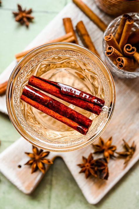 This easy homemade Cinnamon Simple Syrup is perfect for adding to cocktails, coffee and so much more. You only need 3 ingredients and 5 minutes of hands on work to make a big batch that will last for weeks. Vegan Eggnog, Cinnamon Simple Syrup, Crowded Kitchen, Cinnamon Syrup, Cocktail Syrups, Winter Cocktails, Flavored Syrup, Baked Oats, Syrup Recipe