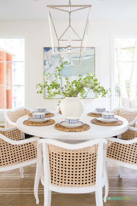 Serena And Lily Round Dining Table, Beach House Dining Rooms, Coastal Breakfast Table, Small Coastal Dining Table, White Dining Room Table Ideas, Coastal Dining Room Round Table, Cozy Coastal Dining Room, White Circle Dining Table, Coastal Dining Table Decor