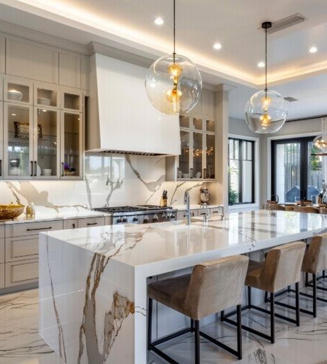 White Kitchen Cabinets With Waterfall Island, Marble Island Countertop, Marble Kitchen Island Modern, Marble Island Kitchen, Multipurpose Kitchen Island, High End Kitchen Design, Big Kitchen Design, Kitchen Counter Design, Kitchens 2021