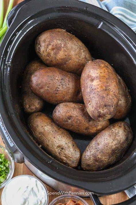 While these crockpot baked potatoes aren't technically oven "baked" they serve the same purpose and taste amazing! #spendwithpennies #bakedpotatoes #easyrecipe #easyside #sidedish #crockpot #slowcooker Crockpot Baked Potatoes, Slow Cooker Baked Potatoes, Crockpot Potatoes, Potato Soup Crock Pot Easy, Oven Roasted Potatoes Easy, Crock Pot Baked Potatoes, Cooking Baked Potatoes, Bacon Wrapped Pork Tenderloin, Slow Cooker Baking