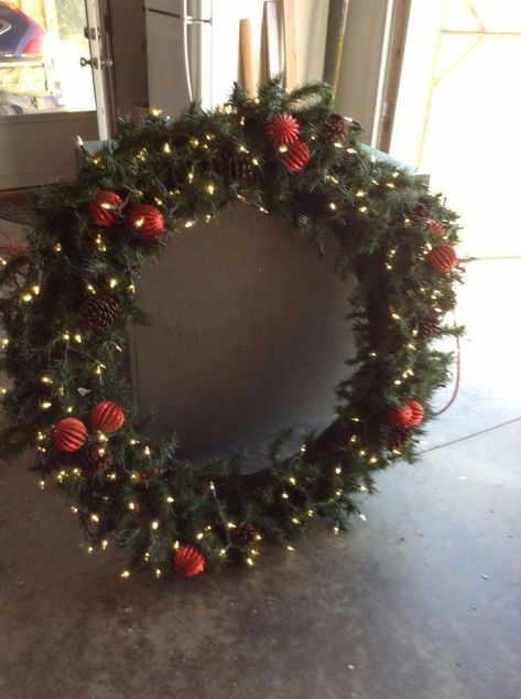 A Giant Christmas Wreath | Hometalk Christmas Garland On Gates, Large Outdoor Wreath Christmas, Oversized Wreath Christmas, Giant Christmas Wreaths, Large Outdoor Christmas Wreaths On House, Diy Big Wreath Christmas, Garage Wreath Christmas, Giant Wreath On House, How To Decorate A Large Christmas Wreath