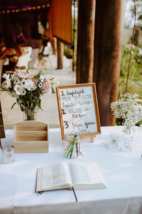 Sign A Bible Wedding, Bible At Wedding Reception, Fun Christian Wedding Ideas, Christian Wedding Table Decor, Christian Beach Wedding Ideas, Bible For Guest Book At Wedding, Bible Verse At Wedding, Grad Party Bible Guest Book, Bible Wedding Photos