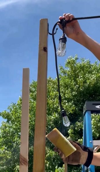 DIY planters with poles for string lights Diy String Light Poles, Backyard String Lights, Backyard Planters, Outdoor Yard Ideas, Outdoor Deck Lighting, Long Boards, Diy String Lights, Hanging String Lights, Wood Sealer