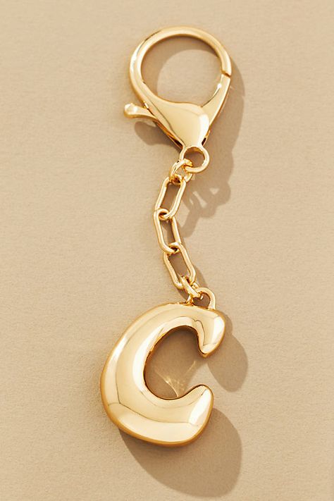 Charming new-trend alert: jewelry for your bag. Bursting with personality, this monogram makes a great gift (for you + a friend)! | Bubble Letter Monogram Bag Charm by Anthropologie, Women's, Zinc Bubble Letter Jewelry, Unique Promotional Products, Thoughtful Gift For Best Friend, Shopping Wishlist Ideas, Thoughtful Friend Gifts, Cute Backpack Keychains, Gift Basket For Friends Birthday, Key Chain Charms, Cute Car Keychains