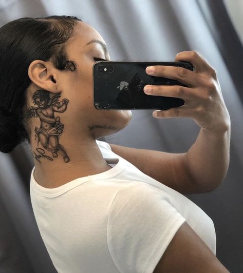 I loveee this angel/cupid tattoo 😍👼🏾 #tattoo #necktattoo #angel #angeltattoo   Pin & Insta: @lovesherworld 💜 Cupid Tattoo, Best Neck Tattoos, Face Tattoos For Women, Girl Neck Tattoos, Side Neck Tattoo, Serpent Tattoo, Model Tattoo, Neck Tattoos Women, Black Girls With Tattoos