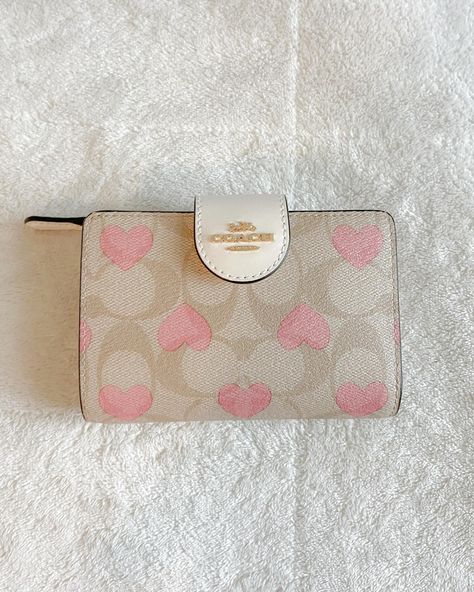 Styling💌 Style this adorable pink heart Coach wallet with me🩷 This wallet is my new main wallet, and I’m obsessed. I’ve had big wallets and small wallets, but this beauty is my first medium sized wallet… and she is perfect! #coquette #coquetteaesthetic #coachwallet #stylewithme Coach Wallets, Cute Purse, Coach Bow Wallet, Wallet Aesthetic, Cute Wallet, Pink Coach Leather Wallet, Coach Pink Wallets For Travel, Pink Wallet Coach, Coach Pink Wallet With Removable Pouch