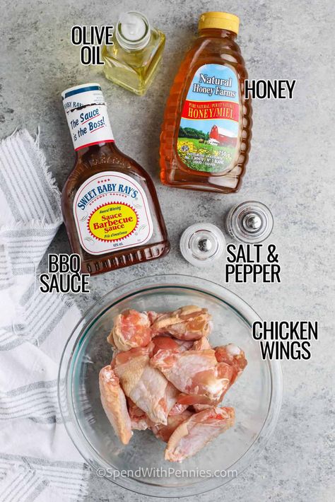 These sweet honey BBQ wings are the meal that the family has been waiting for. Cooked to crispy perfection in the air fryer, these chicken wings will be ready in no time. Then, once the sweet and sticky sauce has been added, it will be so hard to resist these delightfully addictive wings! #honeybbqwings #bakedhoneybbqwings #honeybbqchickenwings #spendwithpennies Air Fryer Bbq Wings, Honey Bbq Wings Air Fryer, Air Fryer Baked Chicken Wings, Bbq Chicken Wings In Air Fryer, Bbq Wings In Air Fryer, Chicken Wing Recipes Air Fryer, Longhorn Salmon, Honey Barbeque Wings, Barbeque Chicken Wings