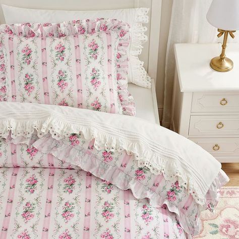 Crafted from soft, durable organic cotton, this duvet cover brings beautiful blooms and color to their bedding. The breathable layer is trimmed with ruffles for an elegant touch and makes a cozy piece for any time of year. Pair with the matching shams for a cohesive set. Designed exclusively for Pottery Barn Kids by lifestyle brand LoveShackFancy. DETAILS THAT MATTER Made of 100% cotton percale with a digitally printed design. Percale weave is a tightly woven weave, which gives the fabric a soft matte finish while providing durability and wears well over time. Duvet reverses to the same print. Duvet cover and shams is finished with velvet tie closures to keep the duvet in place. Twin size duvet is finished with 6 buttons to keep duvet in place. Full/Queen duvet is finished with 8 buttons t Pottery Barn Bedrooms, Fancy Bedroom, Pink Comforter, Shabby Chic Bedding, Pink Bedding, Duvet Covers Twin, Queen Duvet, Beautiful Blooms, Pottery Barn Kids