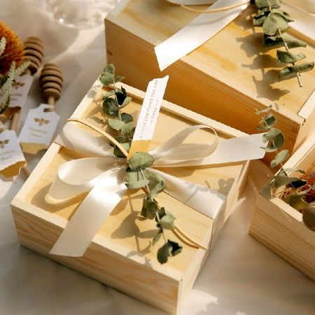 Description: This gift package box is decorated with ribbons and imitation leaves, which adds a romantic and elegant ambience, and it is perfect for wrapping wedding gifts. Sliding cover design makes this gift package box can be easily opened, and the lid does not fall off easily, preventing the gifts inside from falling off. By making with wood material, it can be used for long time. There are 4 sizes to choose from: S, M, L, XL It is great for party favors at weddings, baby showers, birthday p Nesting Gift Boxes, Wedding Candy Boxes, Gift Boxes With Lids, Red Gift Box, Bridesmaid Boxes, Gift Boxes For Women, Gift Wrap Box, Bridesmaid Gift Boxes, Wedding Gift Boxes