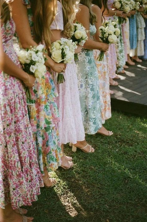 Bridal Party Floral Dresses, Special Things To Do At Your Wedding, Bridesmaids In Floral Dresses, Colorful Floral Bridesmaid Dresses, Mid Matched Bridesmaids, Mismatched Floral Bridesmaids, Small Bridal Party Mismatched Dresses, Different Floral Bridesmaid Dresses, Un Traditional Wedding Ideas