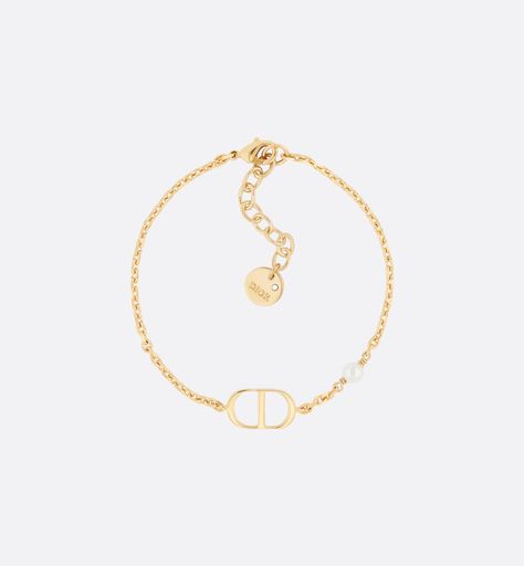 Petit CD Bracelet Gold-Finish Metal with a White Resin Pearl | DIOR Dior Pearl Bracelet, Bracelet Cd, Dior Bracelet Gold, Cd Bracelet, Bracelet Dior, Christian Dior Jewelry, Christian Dior Bracelet, Dior Bracelet, 24 Birthday