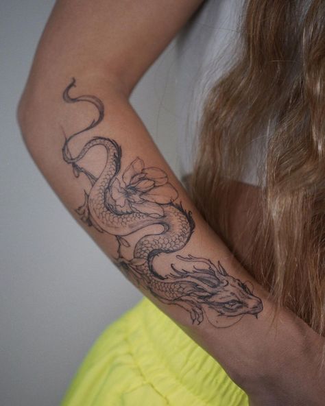 Tattoo artist Polina Matveeva | Saint Petersburg, Russia | iNKPPL Dragon Tattoo Images, Simbols Tattoo, Underarm Tattoo, Dragon Tattoo Arm, Around Arm Tattoo, Small Dragon Tattoos, Chinese Dragon Tattoos, Dragon Sleeve Tattoos, Dragon Tattoo For Women