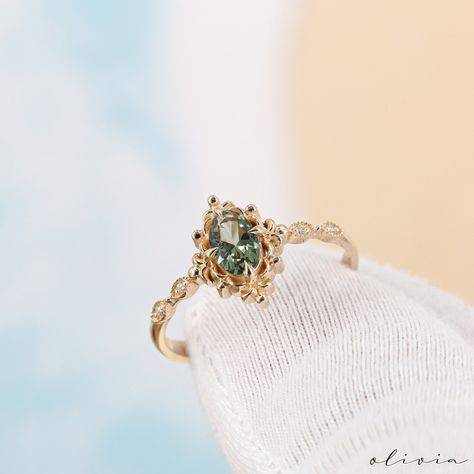 Discover the timeless allure of our Vintage Green Sapphire Engagement Ring, a true embodiment of elegance and vintage charm. Crafted in exquisite 14K and 18k options rose, white, yellow gold, this dainty piece features a brilliant green sapphire, resonating with September's birthstone. Adorned with diamonds and showcasing vintage style, this fine estate ring is designed for a woman seeking both sophistication and a touch of nostalgia. F E A T U R E S 💎 D I A M O N D Carat: 0.03 Quality: VS1 Col Gold Vintage Rings, Vintage Splendor, Green Engagement Rings, Art Deco Rings, Deco Rings, Rings Dainty, Art Deco Sapphire Ring, Pretty Engagement Rings, Green Sapphire Engagement