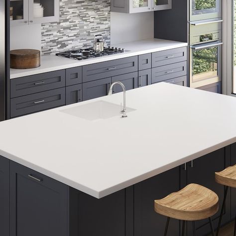 Cheapest White Countertops, Plain White Countertops Kitchen, Solid White Countertops Kitchen, Solid White Quartz Countertop, White Solid Surface Countertops, White Kitchen Countertops Quartz, Shaker Cabinets To Ceiling, Dark Gray Walls Living Room, Solid Surface Kitchen Countertops