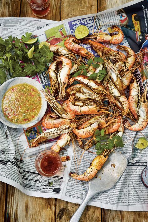 This dish is inspired by the smoked shrimp of Malaysia, udang salai, which is similar to the smoked shrimp of southern Thailand, kung siap. The preparation involves cooking whole shrimp—complete with the heads, shells, and tails—low and slow over wood, coconut husks, or wood charcoal. This shrimp dinner recipe is a peel-and-eat affair, which lends itself well to a cookout or an outdoor summer party. Smoked Shrimp, Cookout Menu, Asian Grill, Dipping Sauces Recipes, Smoked Meats, Seafood Boil, Shrimp Recipe, Smoker Recipes, Chicken Drumsticks