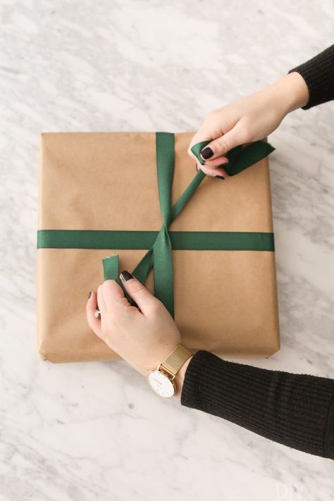 Ribbon Around Gift, Ribbon For Box Wrapping Ideas, How To Do A Ribbon Bow Gift Wrapping, Professional Gift Wrapping Techniques, Ribbon On Presents How To Tie, How To Tie Velvet Ribbon Bow On Present, Gift Wrapping Ribbon Ideas Bow Tutorial, Wrapping A Present, How To Wrap A Jacket As A Gift