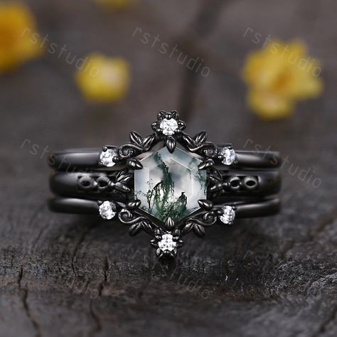 Vintage Hexagon Cut Moss Agate Floral Engagement Ring Set Unique Diamond Bridal Set Dark Promise Wedding Set Black Gold Wedding Band Gift Promise Ring Women Anniversary Gift Christmas Gift 14K Rose Gold / White Gold / Yellow Gold Center Stone: Natural Moss Agate Stone(Every stone is different,if you need special one, please contact us) Measurements: 6x7mm Cut: Hexagon Cut band width(bottom) approx 1.5mm Enhancer Matching band: Stone: 0.1ct Natural SI-H Diamond Prongs pave set Jewelry Maintenance Spooky Wedding Rings, Cheap Unique Engagement Rings, Viking Wedding Ring Sets, Dark Fantasy Engagement Ring, Dark Engagement Ring Unique, Wedding Rings Goth, Black Band Engagement Ring, Non Traditional Wedding Rings Vintage, Witchy Wedding Rings