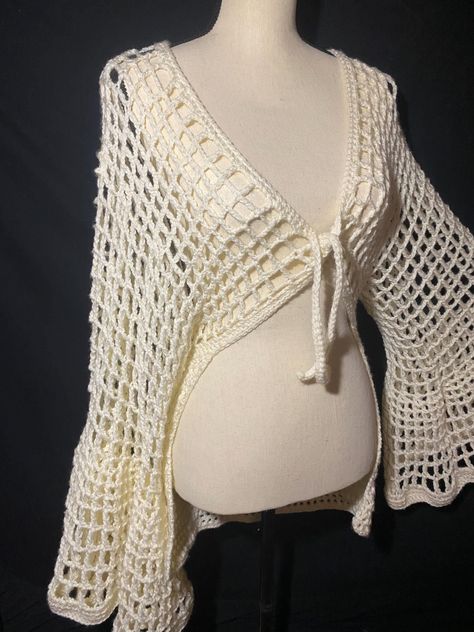 "Eye-Catching Crochets Top Patterns" https://youtu.be/cBxYoxk5EVs?si=J_X3qabQXRHDKBuj Crochet Shawl Collar, Crochet Top With Fabric, Crochet Half Top, Different Crochet Ideas, Crochet Sleeve Top Pattern, Crochet Top Loose, Crochet Clothes Modest, Fish Net Crochet Top, Crochet Fairy Skirt Pattern