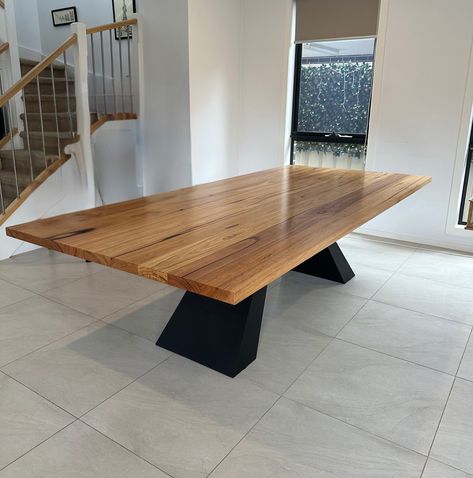 This stunning Monaco dining table features a beautifully crafted solid timber top with striking natural grain patterns. The table is elevated by premium-quality legs made from 10mm solid steel plate, giving it both an industrial edge and unmatched durability. The sleek, black powder-coated finish of the legs perfectly complements the warmth of the timber, creating a bold yet timeless piece that stands as a centerpiece in any modern space. https://lumberfurniture.com.au/products/monaco-di... Recycled Timber Furniture, Timber Dining Table, Timber Vanity, Timber Shelves, Live Edge Dining Table, Timber Furniture, American Black Walnut, Metal Dining Table, Contemporary Furniture Design