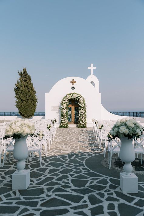 Contemporary Wedding in Kallithea Springs located in Rhodes, Greece. The ceremony took place in St. Sophia, with Faliraki sea view. We decorated the reception with stone, glass and mirrored elements. The flowers were white and greenery was used to make the black & white theme stand out. #destinationweddings #Greece #Rhodes #island #contemporarywedding #blackandwhite #weddingtheme #weddingdecor #weddingevent #weddingphotography #weddingplanning #faliraki #seaview #ceremony #flowerurns #arch Greek Wedding Theme, Rhodes Island Greece, Wedding Color Schemes Blue, Greek Islands Wedding, Small Beach Weddings, Greece Rhodes, Greece Destinations, White Weddings Reception, Rhodes Island