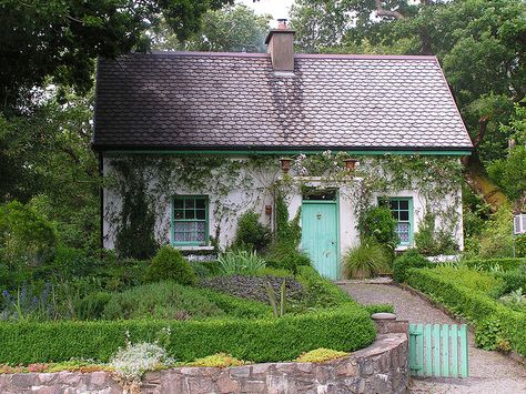 Nowhere have I seen more exquisite cottage living as in the Irish countryside- and most all of them had a garden area (practical yet beautiful) and smoke rising from the chimney. Cute Cottages, Little Cottages, Irish Countryside, Irish Cottage, A Small House, Traditional Cottage, Storybook Cottage, Dream Cottage, Green Door