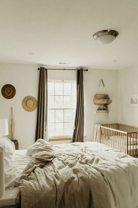 Turn a corner of your bedroom into a mini nursery with a cozy crib, soft rugs, and essential storage solutions. Create a calming space for your baby in your one-bedroom apartment by adding cute wall decals and a small rocking chair for those late-night feedings. Read this article for more tips and tricks! Nursery Guest Room Combo, Apartment Nursery, Nursery Guest Room, Nursery Nook, Parents Bedroom, Baby Corner, Parents Room, Bedroom Updates, Master Room