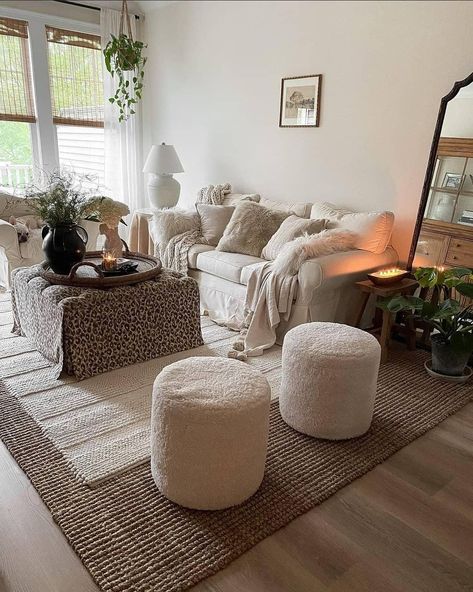 35 Beautiful Ottoman Decor Ideas You Should Try Decorate Ottoman Living Rooms, Living Room With Ottoman Layout, How To Decorate An Ottoman, Ottoman Decor Ideas, Living Room Ottoman Ideas, Living Room With Ottoman, Ottoman Coffee Table Decor, Round Ottoman Coffee Table, Brown Leather Ottoman