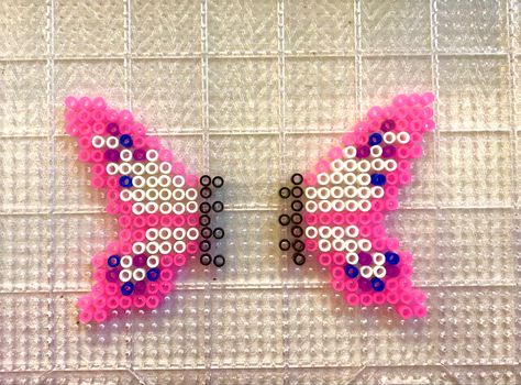 3d pattern for a butterfly made out of perler beads 3d Pearl Beads Pattern Easy, Iron Beads 3d Pattern, 3d Perler Bead Butterfly, Pearler Bead Butterfly Pattern, Peeler Bead Butterfly, Iron Beads Butterfly, Flower Perler Bead Pattern, 3d Melting Bead Patterns, Peeler Bead 3d Patterns