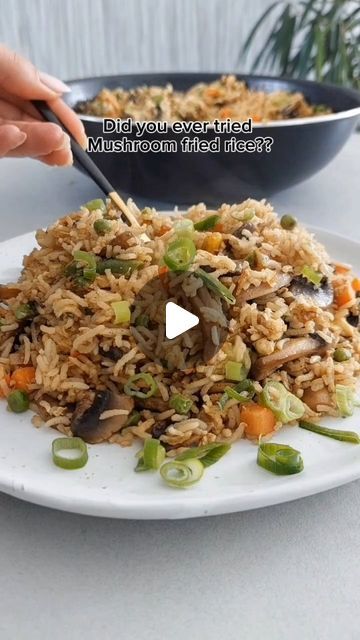 Barbara Bajon on Instagram: "Mushroom and Vegetable Fried Rice Recipe

Ingredients:

6 tablespoons vegetable oil, divided

400g sliced mushrooms

½ teaspoon salt

½ teaspoon black pepper

1 sliced onion

1 cup frozen mixed vegetables

4-5 eggs

2 cups cooked rice

4 tablespoons soy sauce

4 tablespoons sesame oil

Additional salt and pepper to taste

Instructions:

Cook the Mushrooms:

Heat 4 tablespoons of vegetable oil in a large pan or wok over medium-high heat.

Add the sliced mushrooms, ½ teaspoon salt, and ½ teaspoon black pepper.

Fry the mushrooms for about 5 minutes, stirring occasionally, until they are golden brown and tender.

Remove the mushrooms from the pan and set aside.

Cook the Onions and Vegetables:

In the same pan, add 2 tablespoons of vegetable oil.

Add the sliced o Rice And Mixed Vegetable Recipes, Mushroom Fried Rice Recipes, Cooked Mushrooms, Mushroom Fried Rice, Vegetable Fried Rice Recipe, Frozen Mixed Vegetables, Cheap Snack, Sliced Onion, Vegetable Fried Rice