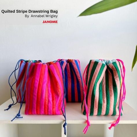 These sweet stripe quilted bags by #janomemaker @littlepincushionstudio are the perfect quick sewing project and make the most perfect gift for anyone! Store your sewing notions when traveling or make it with vinyl lining for the sweetest makeup bag! Tap the link in bio for the full tutorial! #janome #janomeamerica #janomemakes #quilting #sewing #sewists #quilters #makers #newproject #sewingproject #quilt #sew #sewistsofinstagram #makersgonnamake #sewingdiy #quiltingproject Quilted Drawstring Bag Tutorial, Sewing Gift Bags Patterns, Diy Scrap Fabric Ideas, Quilted Drawstring Bag, Sewing Projects Makeup Bag, Sew Project Bag, Sewing Bag Tutorial, Holiday Sewing Projects Diy Gifts, Travel Sewing Projects