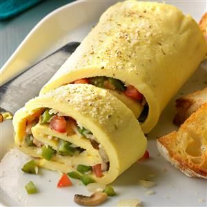 Spiral Omelet Supreme Recipe -This roly-poly omelet is a new way to do eggs for brunch. Want different veggies? You can substitute 2 cups of any type you like. When I'm cooking for gluten-free friends, I leave out the flour and the spiral rolls up a-OK. —Debbie Morris, Hamilton, Ohio Baked Omelette, Cheese Omelet, Recipe Lunch, Hosting Brunch, Omelets Recipe, Brunch Dishes, Awesome Recipes, Roll Recipe, Best Breakfast Recipes