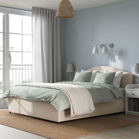 Beige upholstered storage bed with light green sage bedding and soft blue walls Songesand Bed, Bed Frame Legs, Store Bedding, Student Room, Ikea Bed, Classic Bed, Material Bed, Bed Frame With Storage, Upholstered Bed Frame