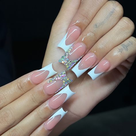 Can never go wrong with some frenchies & some bling 💖 Products used: “Bad N Boujjee” acrylic “045” gel polish all from @vbeautypure #nails #nailtech #acrylicnails #explore #explorepage #frenchnails #blingfrenchies #frenchtipnails Nails Design Ideas Rhinestones, French Tip With Rhinestones Square, French Tip Nails With Righnstones, French Tip Jewel Nails, White French Tip Nails With Diamonds, French Tip With Gems Rhinestones, French Tips With Bling, French Tip Acrylic Nails With Rhinestone, French Tip Nails With Diamonds