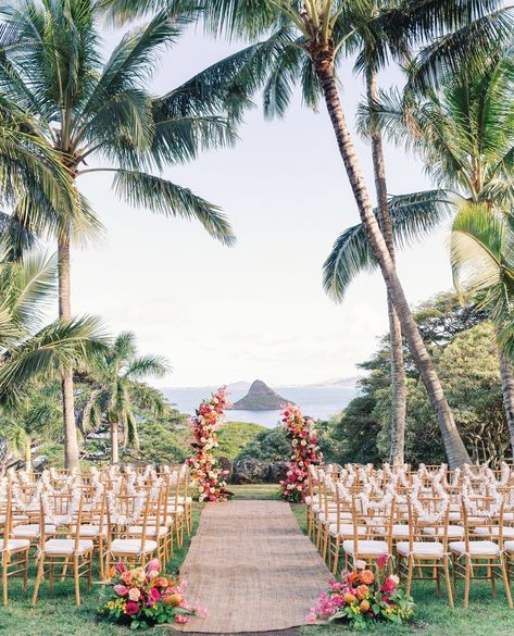 The most perfect ceremony layout and floral arrangements to enhance this amazing view! I mean.. look at those colors!! Kualoa Ranch will always have our heart 😍⁠ ⁠ 📸 @ashleygoodwinphoto⁠ .⁠ .⁠ .⁠ #loveletterweddings #LLW #destinationweddingplanner #destinationwedding #hawaiiweddingplanner #hawaiiwedding #oahuweddingplanner #oahuwedding #tropicalwedding #colorfulwedding #weddingplanner #weddingstyle #weddinginspiration #engaged #weddingstylist #weddingdesign #weddingplanning #weddingday #dream... Hawaii Wedding Arch Ideas, Hawaii Wedding Chapel, Hawaii Wedding Locations, Hawaii Wedding Inspiration, Hawaii Backyard Wedding, Hawaii Small Wedding, Intimate Hawaii Wedding, Hawaii Wedding Aesthetic, Hawaiin Wedding