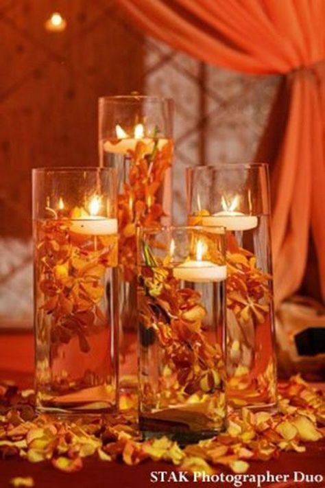 I’m a sucker for adorable and bold fall colors, that’s why I love fall weddings so much! Fall décor is so cozy and inviting – orange, burgundy, chocolate and yellow. Wedding centerpiece is one of the most important parts of décor, so I’ve just...  #wedding #weddingideas #weddingcenterpieces #fallweddings #hmp Autumn Wedding Reception, Deco Champetre, Fall Wedding Centerpieces, Indian Wedding Reception, Fall Wedding Decorations, Orange Wedding, Aisle Decor, Fall Wedding Colors