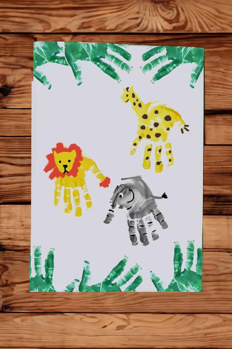 38 Fun & Easy Handprint Craft Ideas Kids Will Love Jungle Animal Handprint Art, Hand Print Animals Preschool, Handprint Art Animals, Hand Print Jungle Animals, Jungle Animal Art For Toddlers, Animals With Hand Prints, 1st Grade Animal Art, Cheetah Handprint Art, Handprint Card Ideas