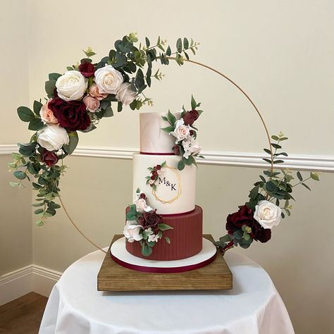 A bold and classic wedding cake in burgundy and dusky pink, with geometric details. Created by Caritas Cake Design - Sussex Wedding Cakes Burgundy And Gold, Wedding Cakes Burgundy And Blush, Burgundy And Pink Wedding Cake, Burgundy Pink And Gold Cake, Simple Wedding Cake Burgundy, Wedding Cake Burgundy Flowers, Maroon And Dusty Pink Flower Wedding Ckae, Wedding Cakes Maroon, Burgundy Cake