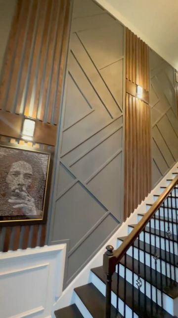 Decorative Stair Wall Ideas, Stairwell Wall Design, Stairs Wall Panelling Design, Accent Wall Going Down Stairs, Wood Panelling Staircase, Tall Wall Paneling Ideas, Black Accent Stair Wall, Staircase Wall Panelling Ideas, Stair Panelling With Handrail