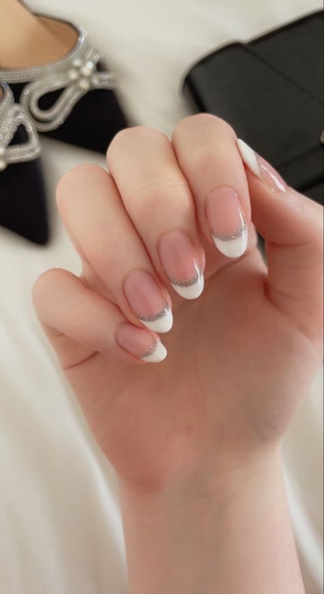 Bridal Gel Nails Wedding French Tips, French Tip White And Silver, French Tip With Silver Accent, Cute French Nails Ideas With Glitter, Almond French Tip Nails With Silver Line, French With Silver Nails, White And Sparkle French Tip, White French Tip Silver Glitter, French Manicure Silver Line