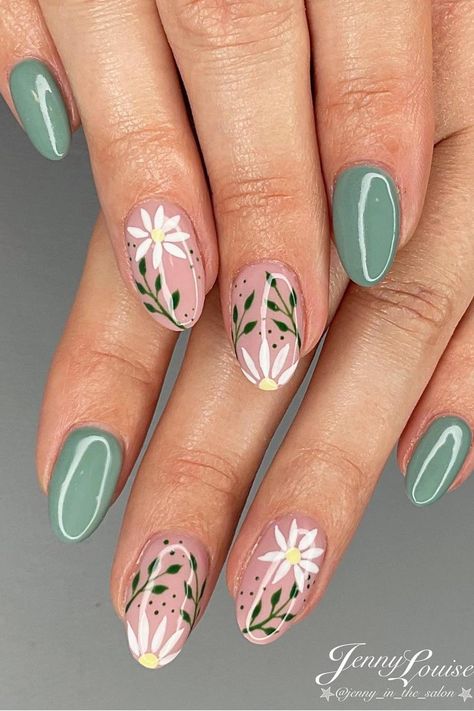 Embrace Spring's Blooming Beauty with Serene Sage Green and Pastel Pink Oval Nails. Click here to explore the delicate floral art adorning these fresh and feminine almond-shaped nails, complete with dainty white daisies and subtle green foliage. 🌸🍃 // Photo Credit: Instagram @pinkysnailsandbeauty Nail Design Gold, Sage Green Nails, Colorful Nails, Purple Nail, Summery Nails, Cute Gel Nails, Spring Nail Art, Easter Nails, Pink Nail