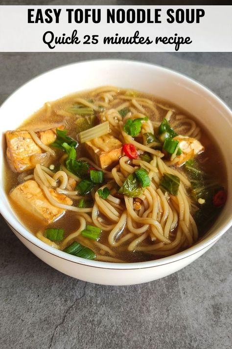 A bowl of tofu noodle soup garnishes with chopped spring onion greens. Tofu Noodle Soup, Vegan Noodle Soup, Vegan Noodles Recipes, Asian Soup Noodle, Asian Soup Recipes, Recipes To Try At Home, Tofu Noodles, Tofu Soup, Vegan Noodles