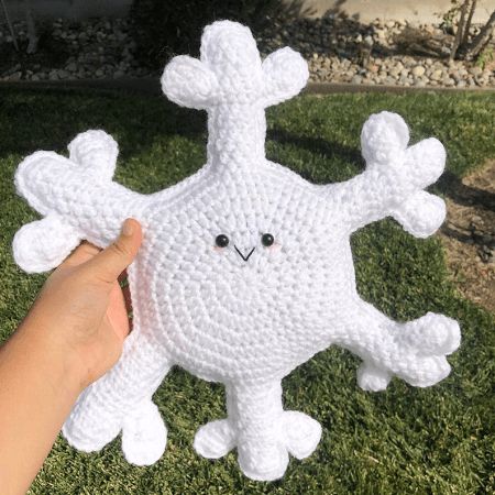 50 Crochet Snowflake Patterns | Crochet News Crochet Snowflake Amigurumi, Snow Crochet, Snowflake Pillow Crochet Pattern Free, Snowflake Pillow Crochet, Crochet Snowflake Pillow Pattern, Snow Flake Crochet Pattern Free, Crochet Holiday Pillow, Crochet Snowflake Pillow, Winter Amigurumi Free Pattern